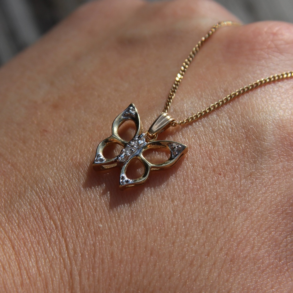 Vintage 10k solid gold and diamond accent butterfly charm/pendant